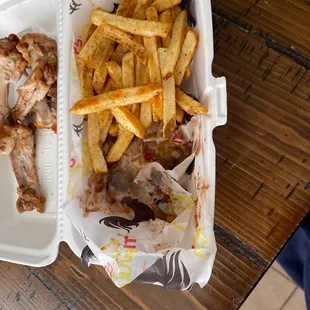 Tiny portion of fries, mediocre flavor - definitely not worth $13 for 5 wings