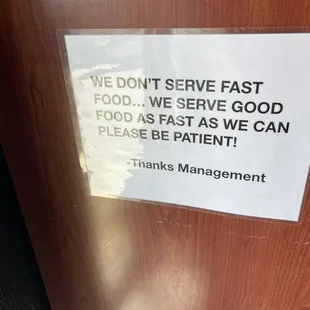a sign on the door of a restaurant