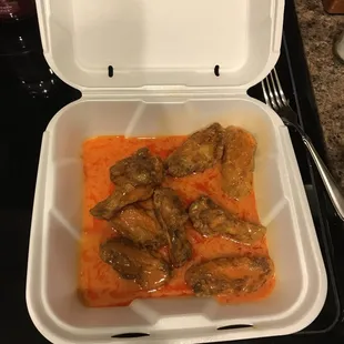 a meal in a styrofoam container