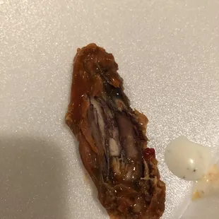 22 bucks for 20 wings that are super small and burnt to shit wings are black inside