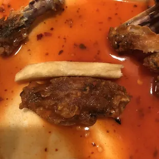 22 bucks for burnt wings lady who took my order telling me to hurry because they'll close in 15 minutes