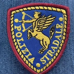 a closeup of a patch on a denim jacket