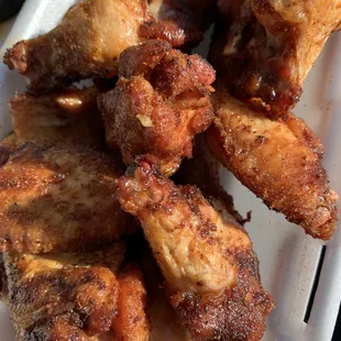chicken wings in a styrofoam container