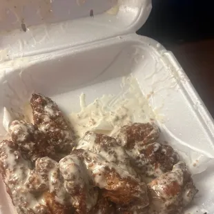 garlic Parmesan wingz , is drowned in ranch dressing, shit is discussing