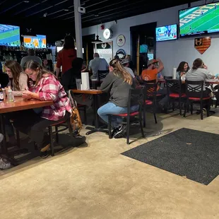 Watching the Clemson - Norte Dame game - on teeny, tiny TVs.