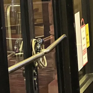The chain they use to not allow customers to come in at 8:30pm on a Saturday night. Their sign says they are open until 10pm