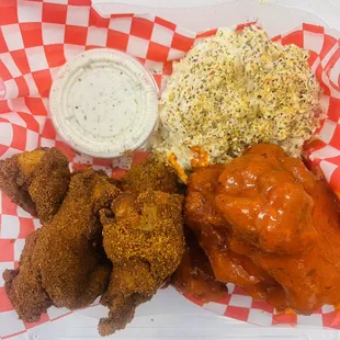 Grandma's Original Buffalo and Cajun wings with side of potato salad and Wingopolis ranch.