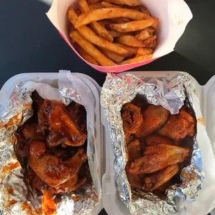 Bourbon wings (left), honey hot (right), and seasoned fries.
