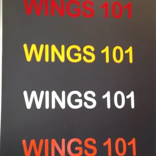 a sign for wings 101