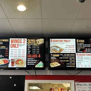 menus on the wall of a fast food restaurant