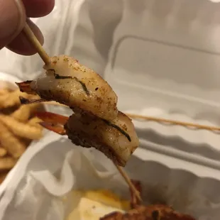 Grilled shrimp...none were cleaned properly.