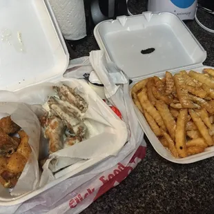 Garlic ranch and hot lemon pepper wings. REGULAR sized fry