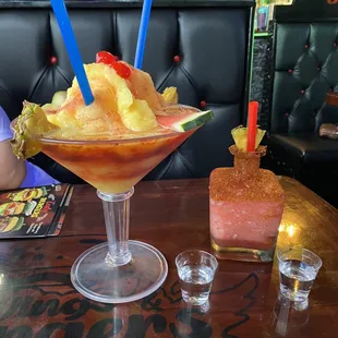 a drink and a slice of watermelon