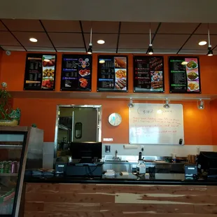 a woman behind the counter