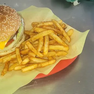 Let&apos;s enjoy a huge cheese burger here at wings mix. Very yummy