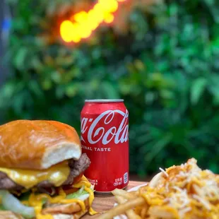 a burger and fries on a table
