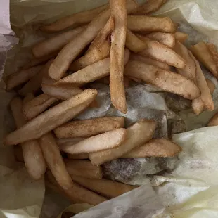 Cold burnt over salted fries with cold chicken