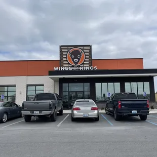 cars parked in front of the building