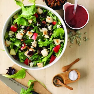 a salad in a bowl with dressing