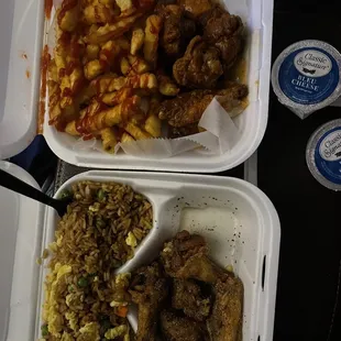 a variety of food in styrofoam containers