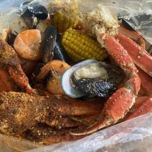 crab legs, corn, corn on the cob, corn on the cob, corn on the cob,