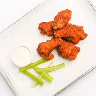 a plate of food with celery