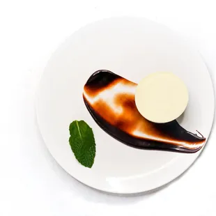 a white plate with a dessert on it