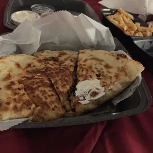 Spicy chicken quesadilla and a side of fries
