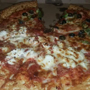 Too much feta cheese on his not enough veggies on mine... tsk ... tsk .. tsk...