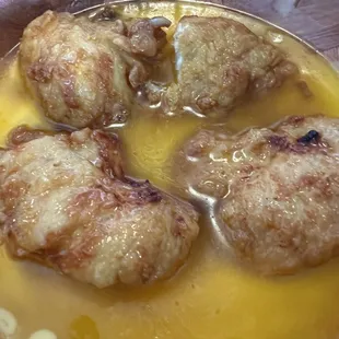 a chicken dish with sauce