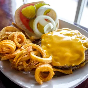Cooked fresh to order 4oz cheeseburger, with cajun french fries.