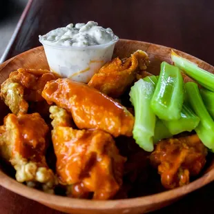 Wings served fresh daily with out famous blue cheese dressing.