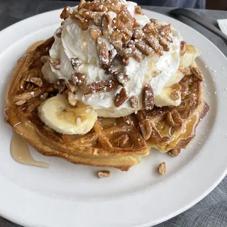 Belgian Waffle Topped with Pecans, Bananas and Whipped Cream