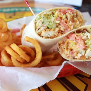 a wrap of coleslaw and onion rings