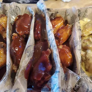 L - R: Hot Honey Garlic, Asian Kick, Jerkin Barbie, Maholo-Que, Garlicky Parm