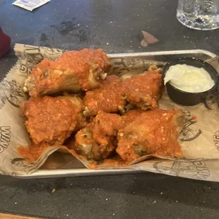 The wall habenero hot sauce with 7pc wings and blue cheese. Hot as hell