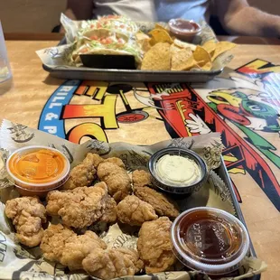 Boneless wings and fish tacos.