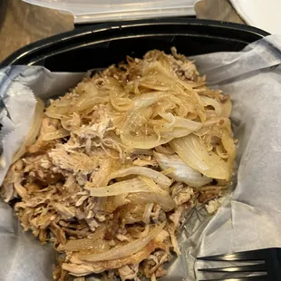 Pulled pork with cooked onions and no bun