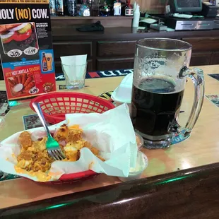 Loaded tots (w/onions) green bean fries (to go) and a 34oz Breckinridge Vanilla Porter...NICE!