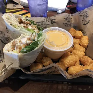 Delicious Chicken Caesar Wrap with Tots and Beer Cheese!