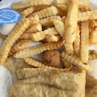 a tray of french fries and dipping sauce