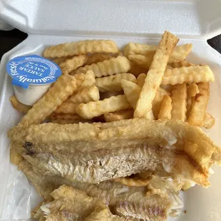 fish and fries in a styrofoam container