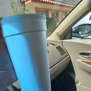 $4.85 Coke smaller than a Venti cup from Starbucks. More like a Grande size.