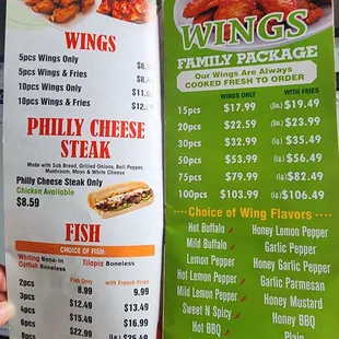 a menu for wings and cheese steak