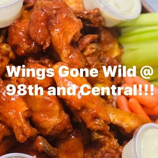 a bowl of buffalo wings and celery
