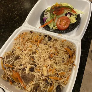 a meal in a styrofoam container