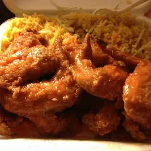 Mumbo sauce on the wings with fried rice... Spring roll with shrimp inside great!
