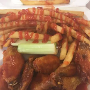 Medium wings with fries.
