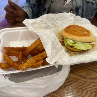 Chicken and shrimp burger with onion rings