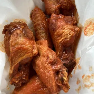 chicken wings in a paper bag